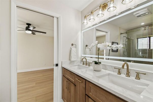 Bathroom, Dual Sink Vanities, Glass Shower, Interior, Wood Texture Flooring