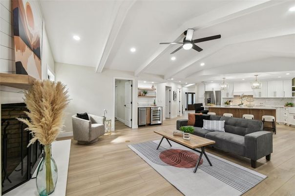 Fireplace, Interior, Kitchen, Living room, Pendant Lights, Recessed Lighting, Stainless Steel Appliances, Wood Texture Flooring