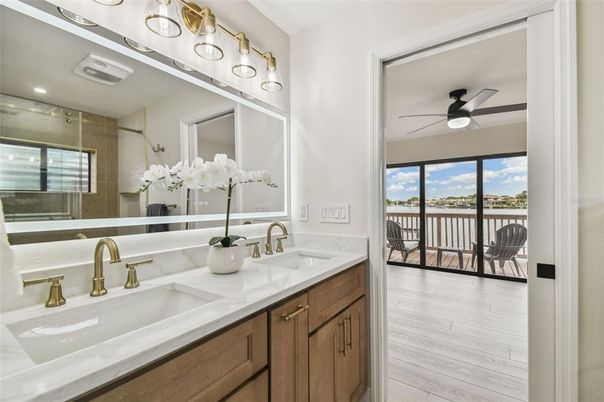 Bathroom, Dual Sink Vanities, Interior, Recessed Lighting, Wood Texture Flooring