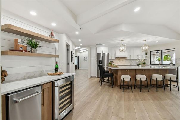 Chandelier, Interior, Kitchen, Pendant Lights, Recessed Lighting, Stainless Steel Appliances, Wood Texture Flooring