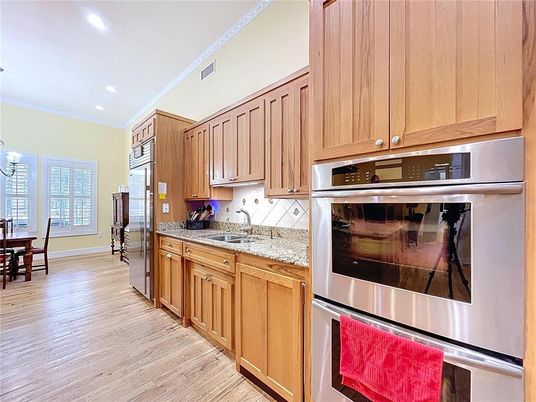 Dining room, Interior, Kitchen, Recessed Lighting, Stainless Steel Appliances, Wood Texture Flooring