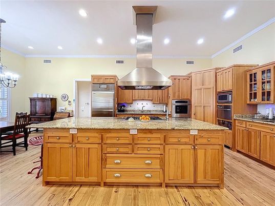 Dining room, Interior, Kitchen, Recessed Lighting, Stainless Steel Appliances, Wood Texture Flooring