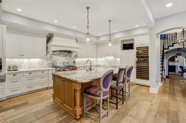Interior, Kitchen, Marble Walls, Pendant Lights, Recessed Lighting, Stainless Steel Appliances, Wood Texture Flooring