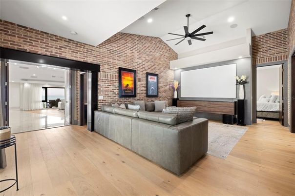 Bedroom, Fireplace, Interior, Recessed Lighting, Stone Walls, Wood Texture Flooring