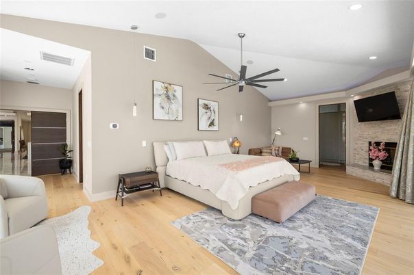 Bedroom, Fireplace, Interior, Recessed Lighting, Stone Walls, Wood Texture Flooring