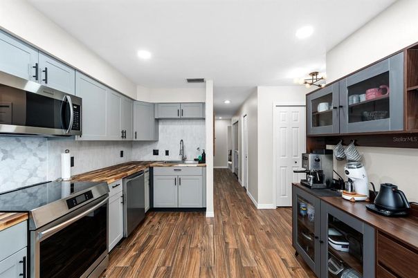 Interior, Kitchen, Recessed Lighting, Stainless Steel Appliances, Wood Texture Flooring