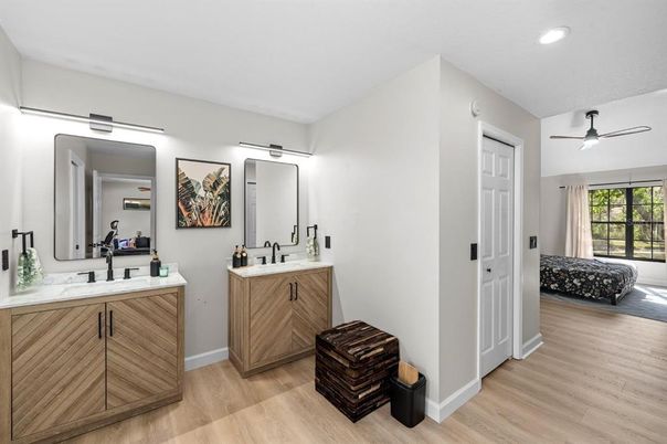 Bathroom, Dual Sink Vanities, Interior, Recessed Lighting, Wood Texture Flooring