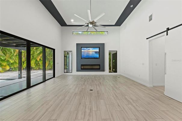 Empty room, Fireplace, Interior, Recessed Lighting, Wood Texture Flooring