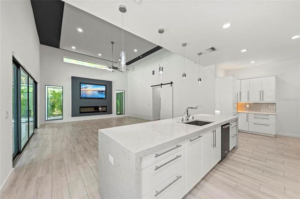 Fireplace, Interior, Kitchen, Pendant Lights, Recessed Lighting, Wood Texture Flooring
