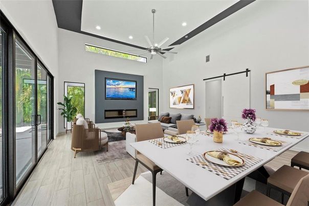 Dining room, Fireplace, Interior, Living room, Pendant Lights, Recessed Lighting, Wood Texture Flooring
