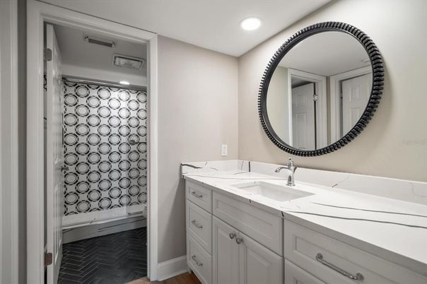 Bathroom, Dual Sink Vanities, Interior, Recessed Lighting, Wood Texture Flooring