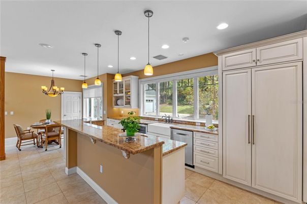 Chandelier, Dining room, Interior, Kitchen, Pendant Lights, Recessed Lighting, Stainless Steel Appliances