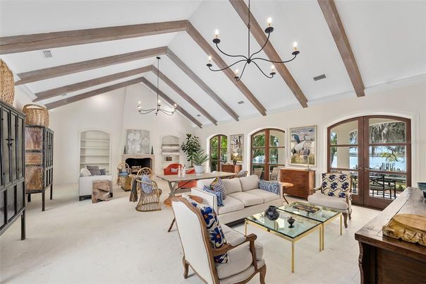 Chandelier, Fireplace, Interior, Living room, Wooden Beams