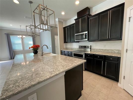 Chandelier, Dining room, Interior, Kitchen, Pendant Lights, Recessed Lighting, Stainless Steel Appliances