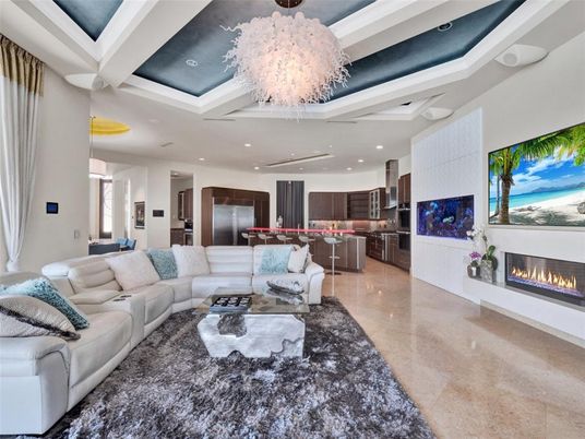 Chandelier, Fireplace, Interior, Kitchen, Living room, Pendant Lights, Recessed Lighting, Stainless Steel Appliances