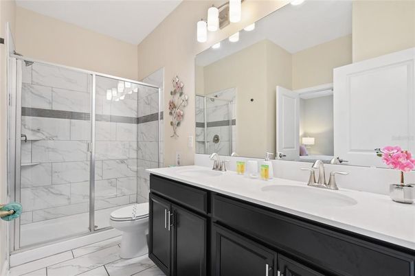 Bathroom, Dual Sink Vanities, Glass Shower, Interior, Marble, Marble Walls