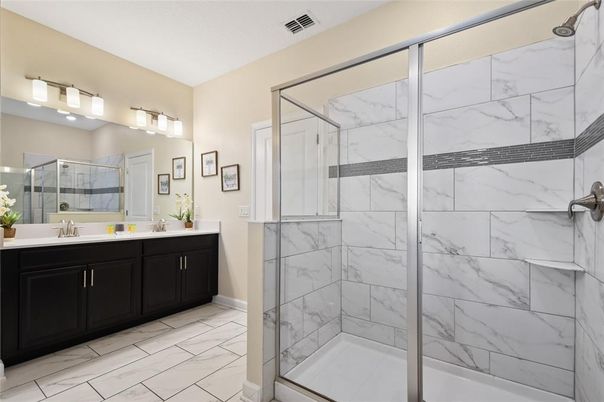 Bathroom, Dual Sink Vanities, Glass Shower, Interior, Marble, Marble Walls