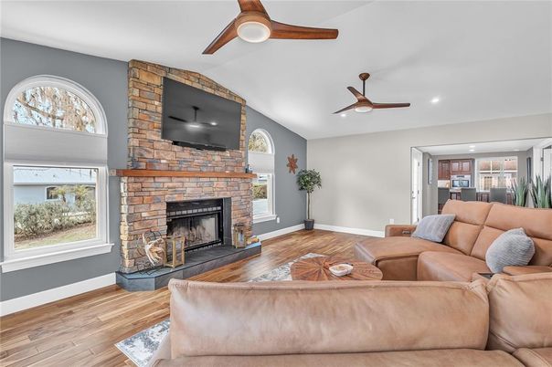 Fireplace, Interior, Kitchen, Living room, Recessed Lighting, Stone Walls, Wood Texture Flooring
