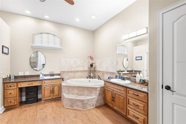 Bathroom, Dual Sink Vanities, Interior, Recessed Lighting, Wood Texture Flooring