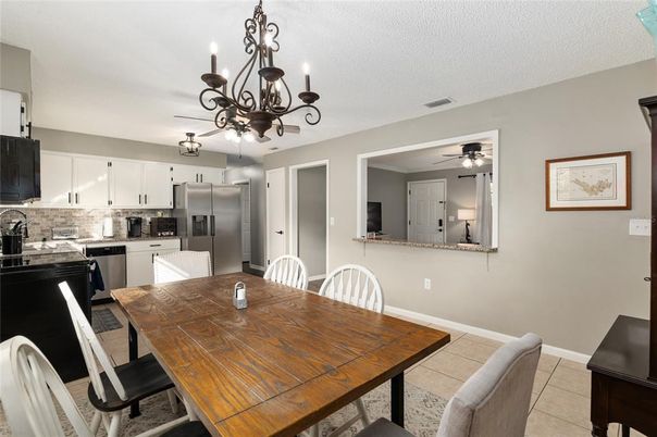 Chandelier, Dining room, Interior, Kitchen, Stainless Steel Appliances
