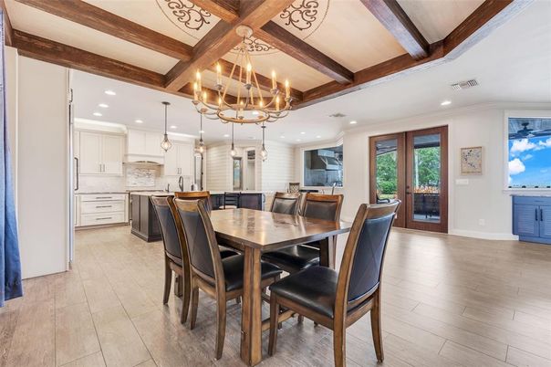 Chandelier, Dining room, Interior, Kitchen, Pendant Lights, Recessed Lighting, Wooden Beams, Wood Texture Flooring