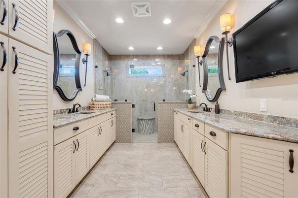 Bathroom, Dual Sink Vanities, Glass Shower, Interior, Marble Walls, Recessed Lighting