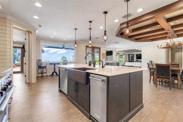 Chandelier, Dining room, Interior, Kitchen, Pendant Lights, Recessed Lighting, Stainless Steel Appliances, Wooden Beams, Wood Texture Flooring