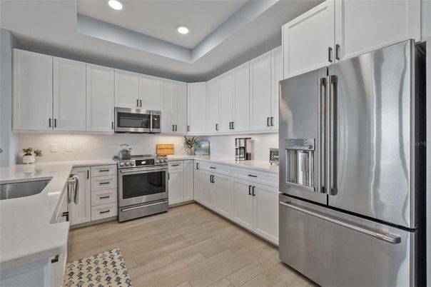 Interior, Kitchen, Recessed Lighting, Stainless Steel Appliances, Wood Texture Flooring