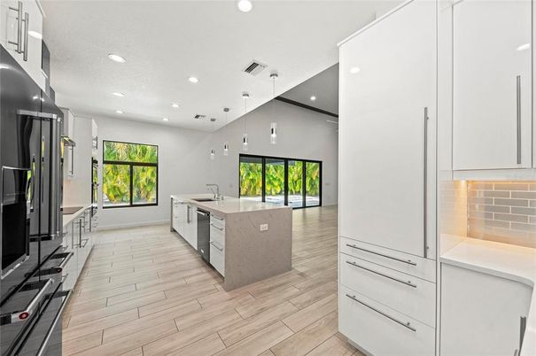 Interior, Kitchen, Pendant Lights, Recessed Lighting, Stainless Steel Appliances, Wood Texture Flooring