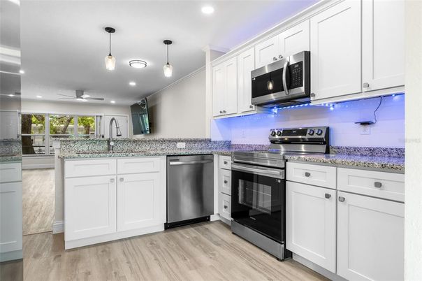 Interior, Kitchen, Pendant Lights, Recessed Lighting, Stainless Steel Appliances, Wood Texture Flooring