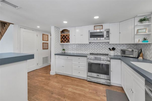 Interior, Kitchen, Recessed Lighting, Stainless Steel Appliances, Wood Texture Flooring