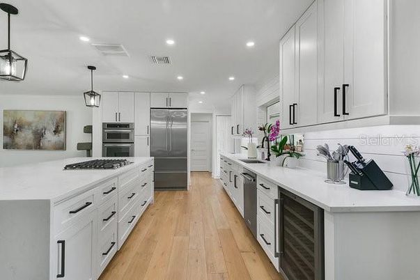 Interior, Kitchen, Pendant Lights, Recessed Lighting, Stainless Steel Appliances, Wood Texture Flooring