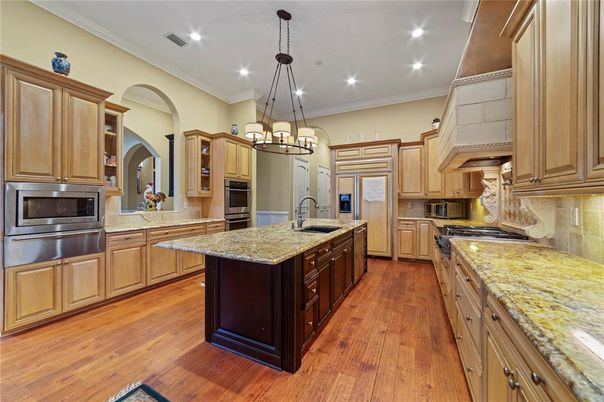 Chandelier, Interior, Kitchen, Pendant Lights, Recessed Lighting, Stainless Steel Appliances, Wood Texture Flooring