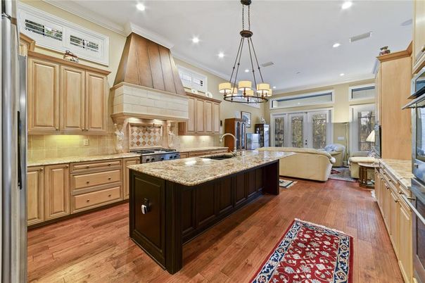 Chandelier, Interior, Kitchen, Living room, Recessed Lighting, Stainless Steel Appliances, Wood Texture Flooring