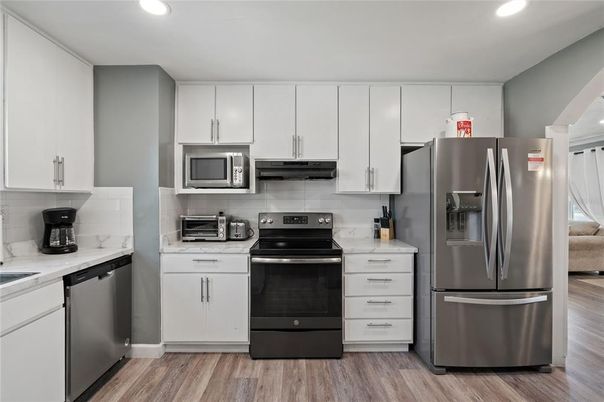 Interior, Kitchen, Recessed Lighting, Stainless Steel Appliances, Wood Texture Flooring