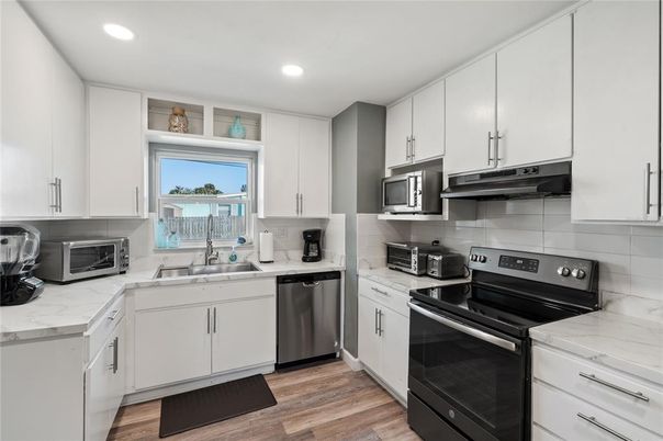Interior, Kitchen, Recessed Lighting, Stainless Steel Appliances, Wood Texture Flooring