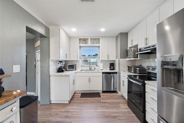 Interior, Kitchen, Recessed Lighting, Stainless Steel Appliances, Wood Texture Flooring
