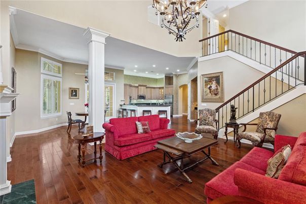Chandelier, Interior, Kitchen, Living room, Recessed Lighting, Stainless Steel Appliances, Wood Texture Flooring