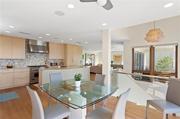 Dining room, Interior, Kitchen, Pendant Lights, Recessed Lighting, Stainless Steel Appliances, Wood Texture Flooring