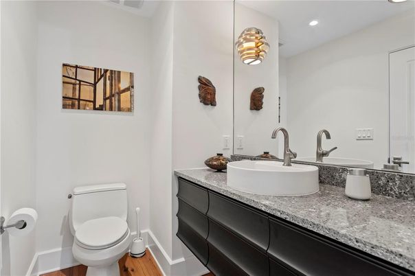 Bathroom, Dual Sink Vanities, Interior, Recessed Lighting, Wood Texture Flooring