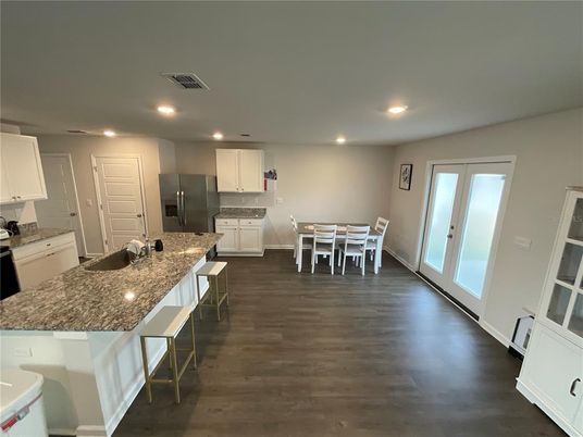 Dining room, Interior, Kitchen, Recessed Lighting, Stainless Steel Appliances, Wood Texture Flooring