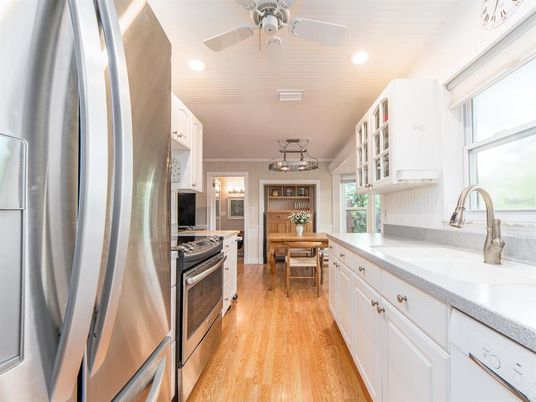 Dining room, Interior, Kitchen, Recessed Lighting, Stainless Steel Appliances, Wood Texture Flooring