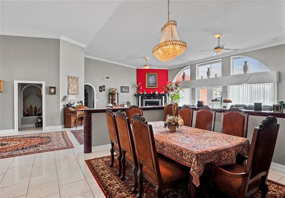 Chandelier, Dining room, Fireplace, Interior, Pendant Lights
