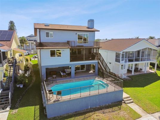 Exterior, Pool, Solar Panels