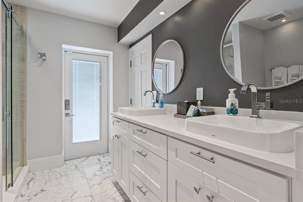 Bathroom, Dual Sink Vanities, Glass Shower, Interior, Marble, Recessed Lighting