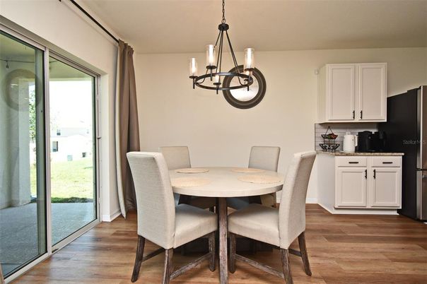 Chandelier, Dining room, Interior, Pendant Lights, Wood Texture Flooring