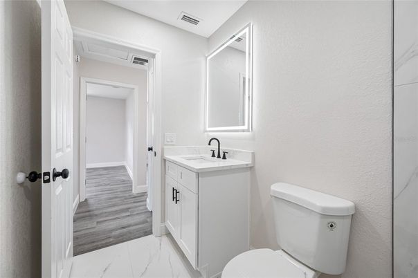 Bathroom, Dual Sink Vanities, Interior, Marble, Wood Texture Flooring