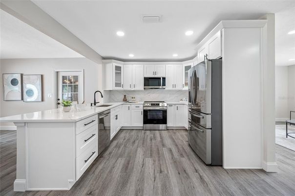 Interior, Kitchen, Recessed Lighting, Stainless Steel Appliances, Wood Texture Flooring