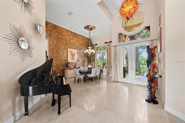 Chandelier, Dining room, Interior, Piano, Recessed Lighting