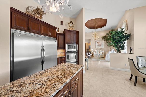 Chandelier, Dining room, Interior, Kitchen, Pendant Lights, Recessed Lighting, Stainless Steel Appliances